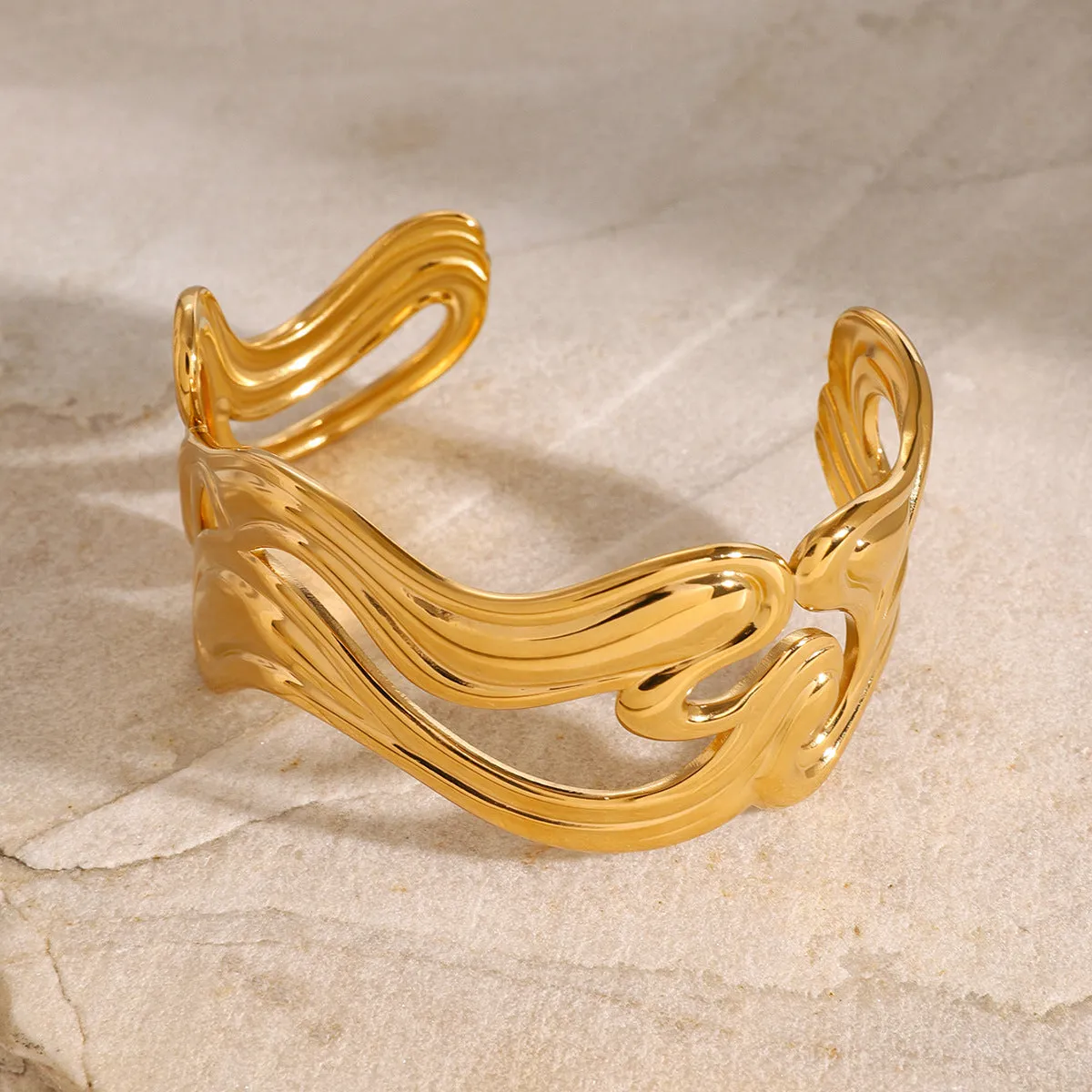 Women's Gold Bracelet Stainless Steel Open-Ended Wavy Design sold by Hensley London product image thumbnail 4