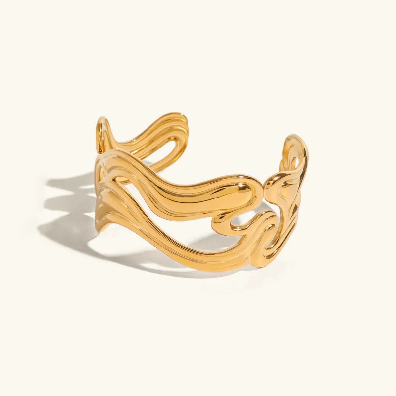 Women's Gold Bracelet Stainless Steel Open-Ended Wavy Design sold by Hensley London
