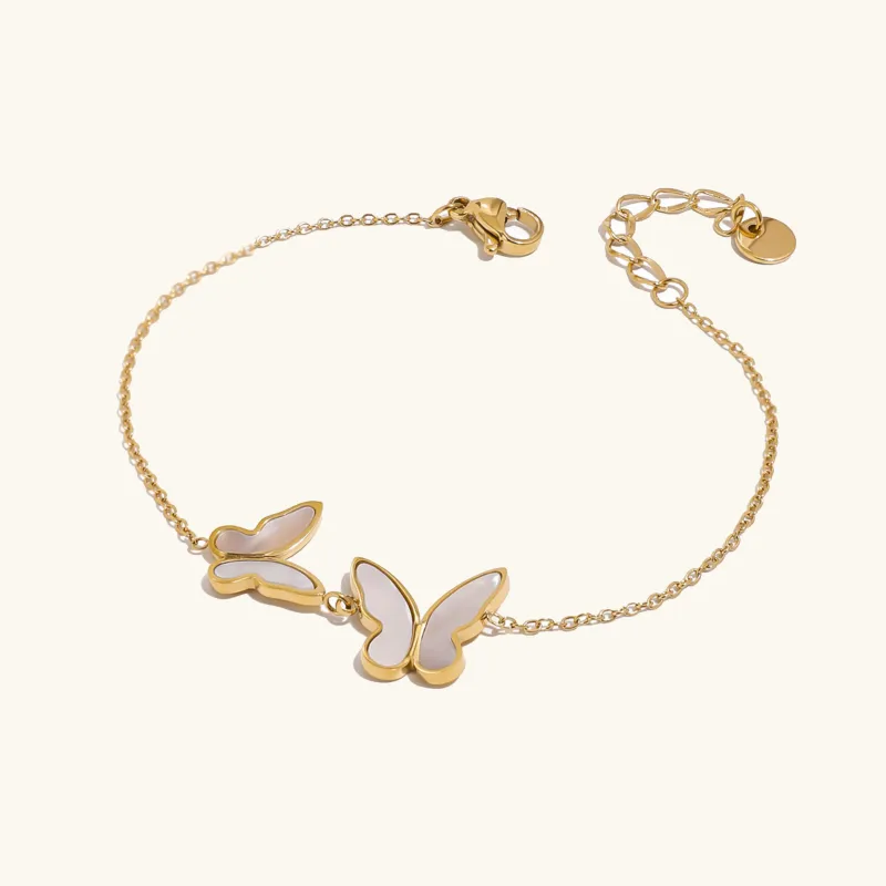 Women's Pearl Bracelet Gold Stainless Steel Butterfly Design sold by Hensley London