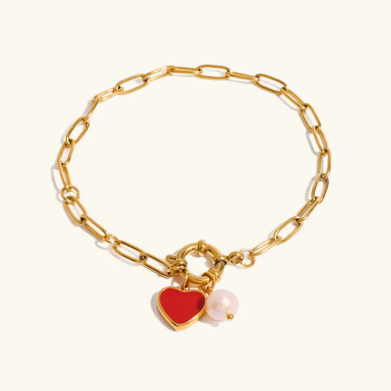 Women's Heart Charm Bracelet Gold Stainless Steel with Freshwater Pearls sold by Hensley London