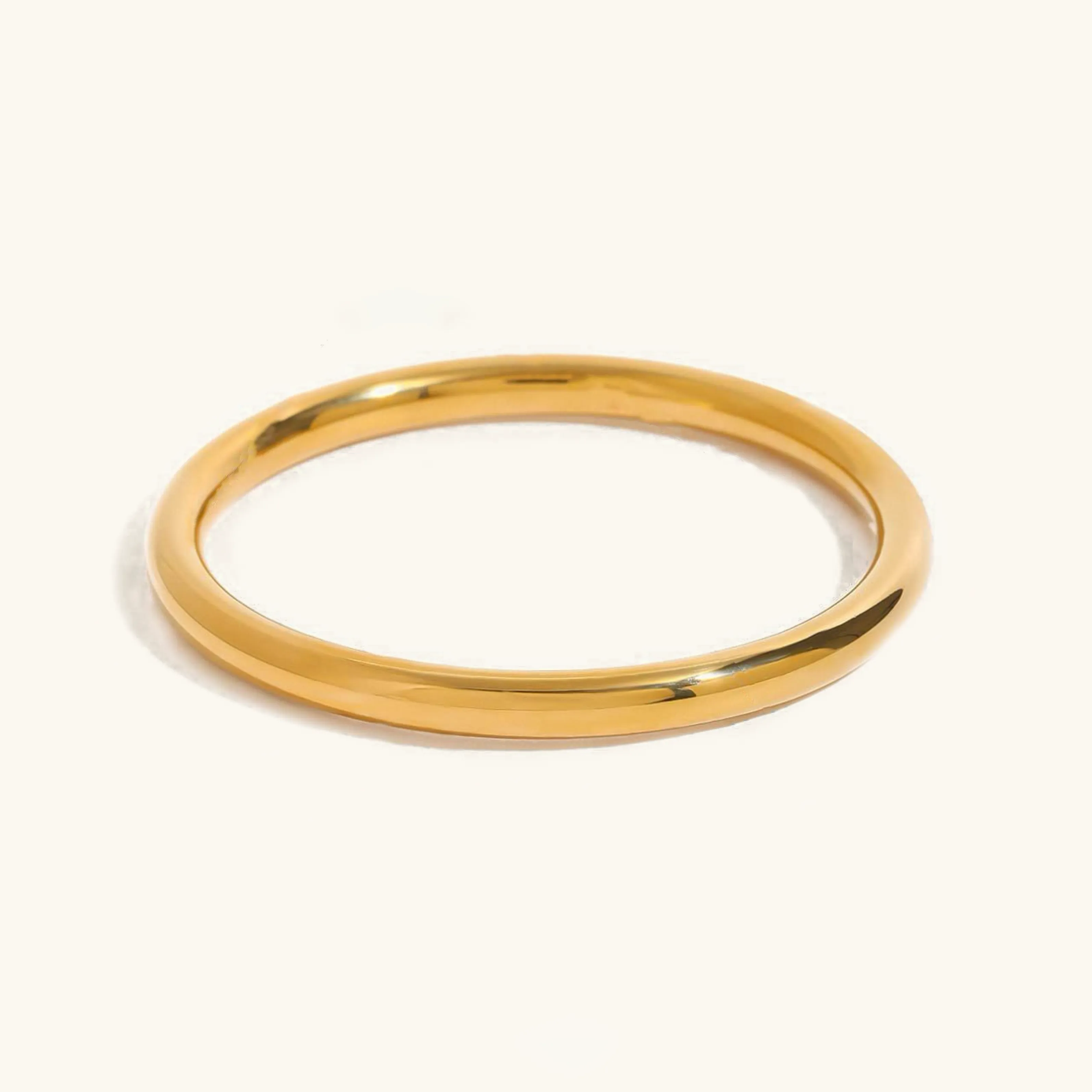Women's Gold Bangle Smooth Stainless Steel 18k Gold sold by Hensley London