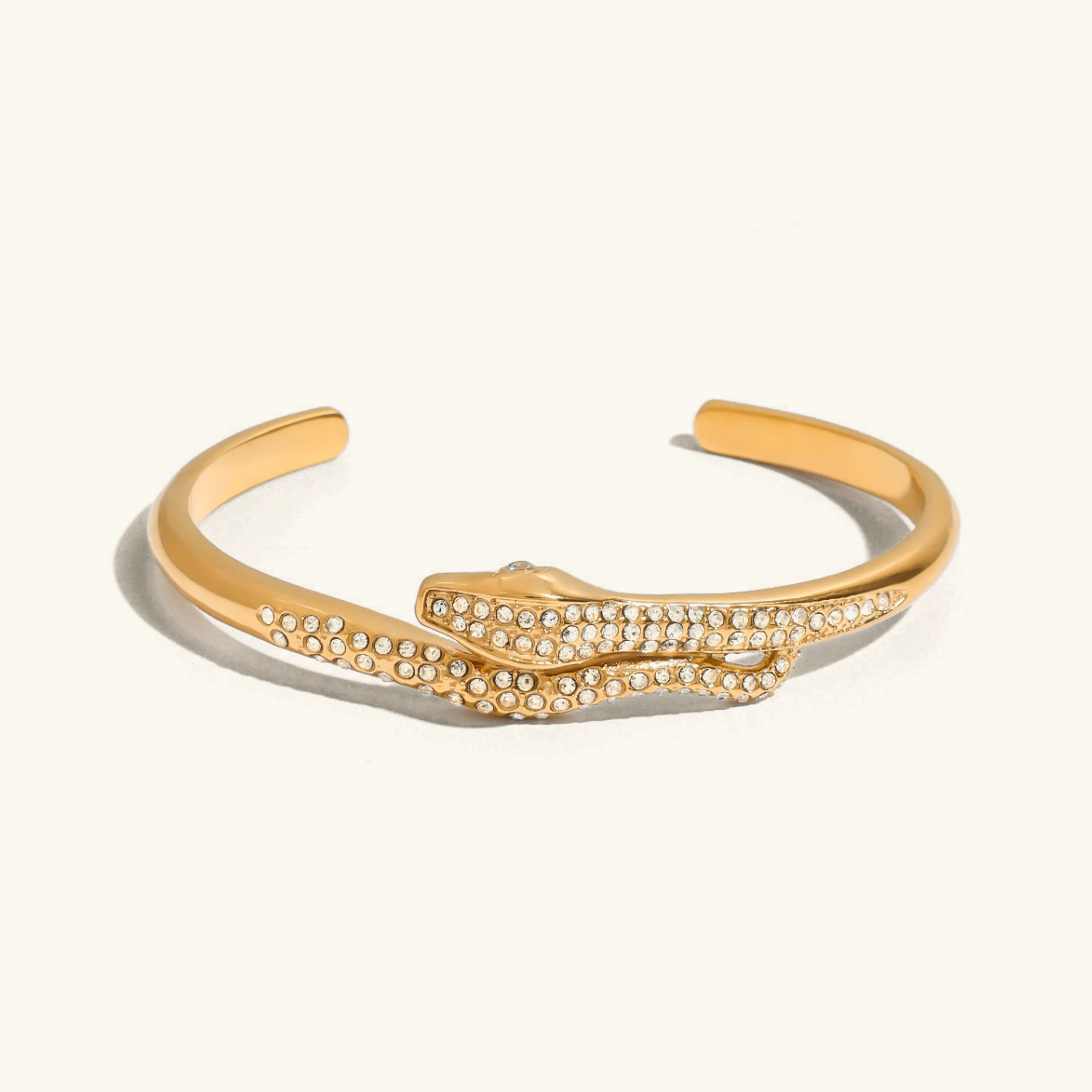 Women's Serpentine Bangle Gold Stainless Steel with Diamond Simulants sold by Hensley London