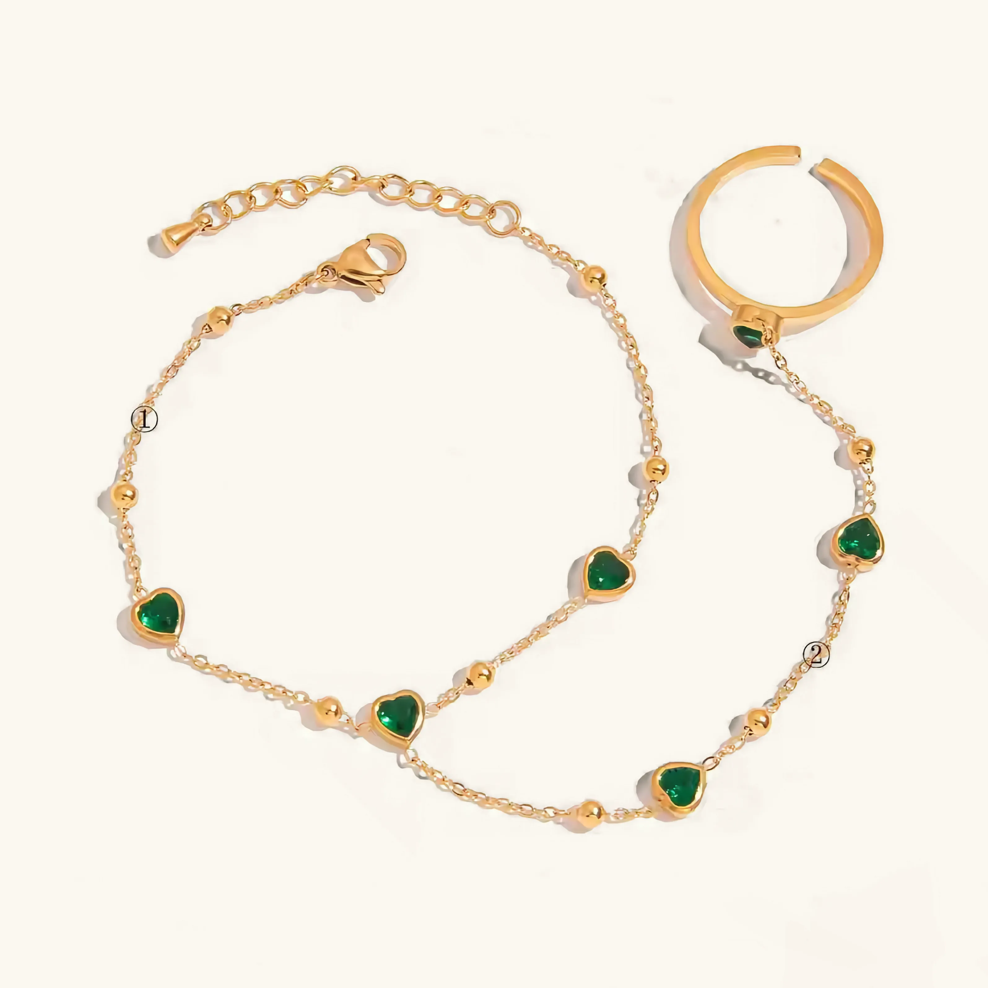 Women's Hand Chain Emerald Stainless Steel-Plated 18k Gold sold by Hensley London
