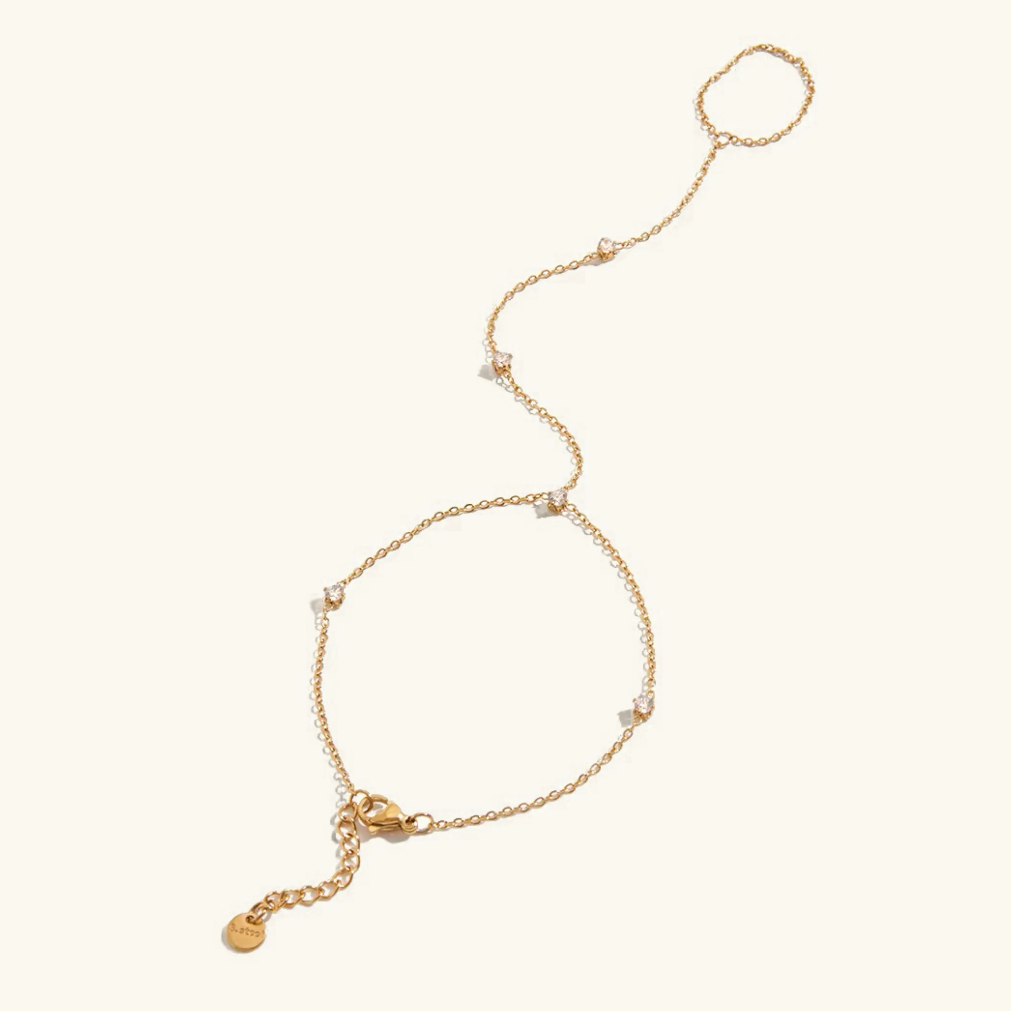 Women's Hand Chain Gold Stainless Steel with Diamond Simulants sold by Hensley London