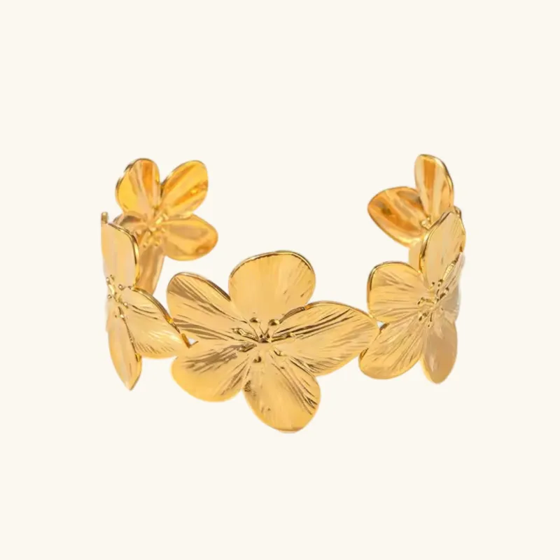 Women's Floral Bangle Gold Stainless Steel sold by Hensley London