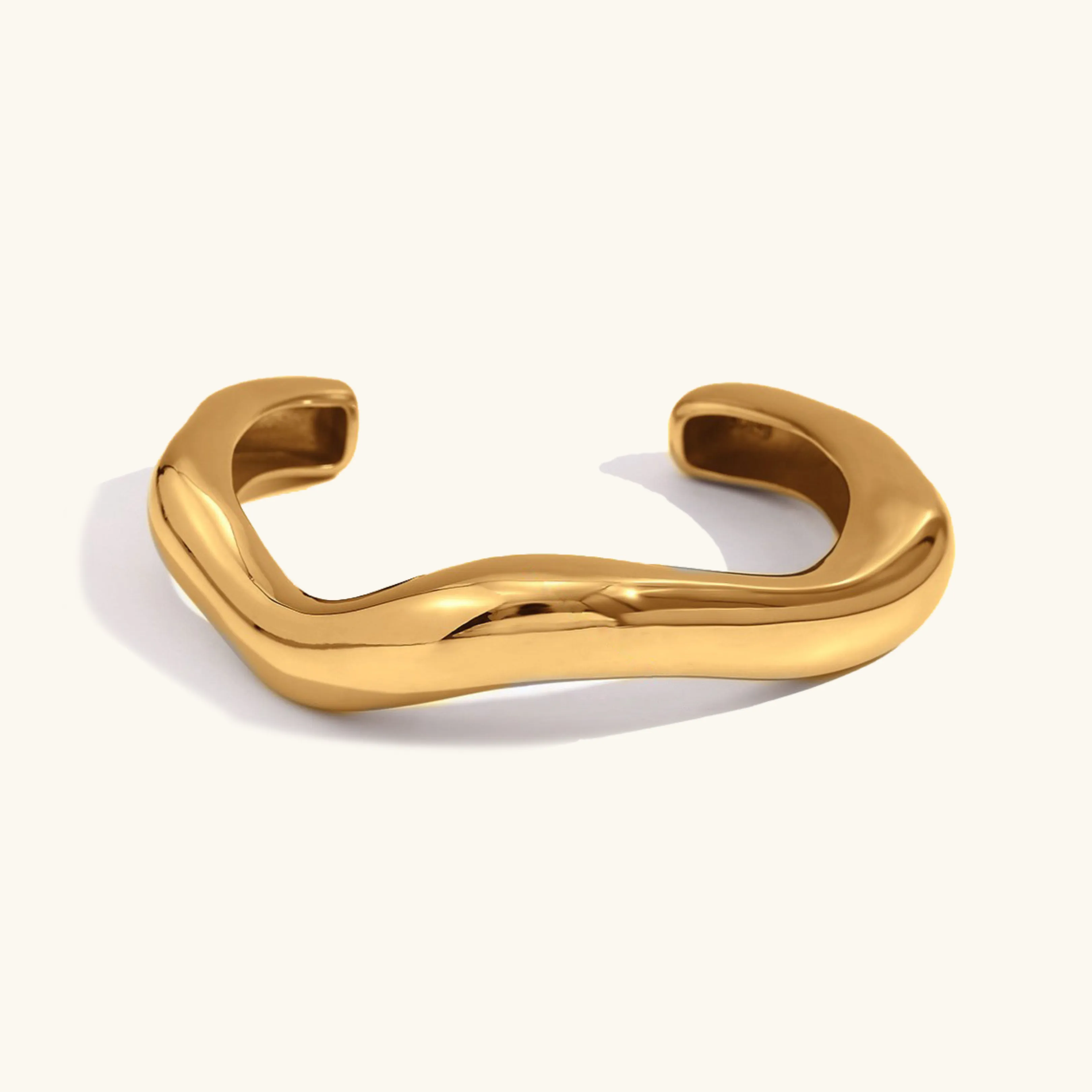 Women's Asymmetrical Bangle Gold Stainless Steel sold by Hensley London
