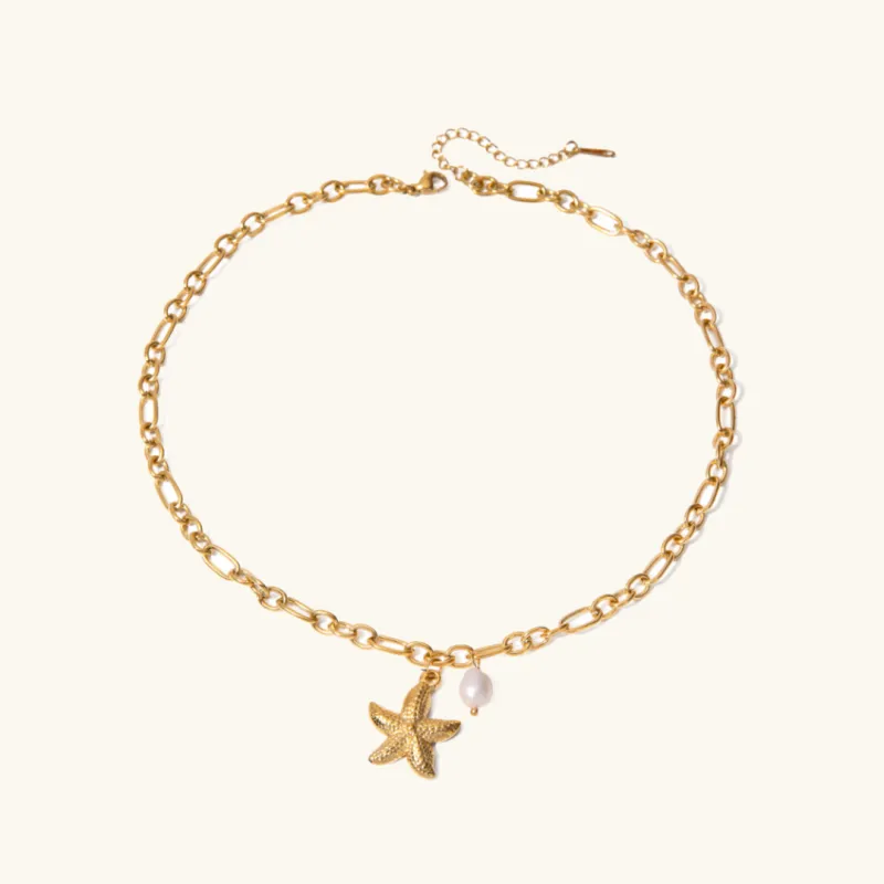 Dainty Gold Necklace with Starfish Pendant and Freshwater Pearl – Waterproof 18k Gold-Plated Chain for Women sold by Hensley London