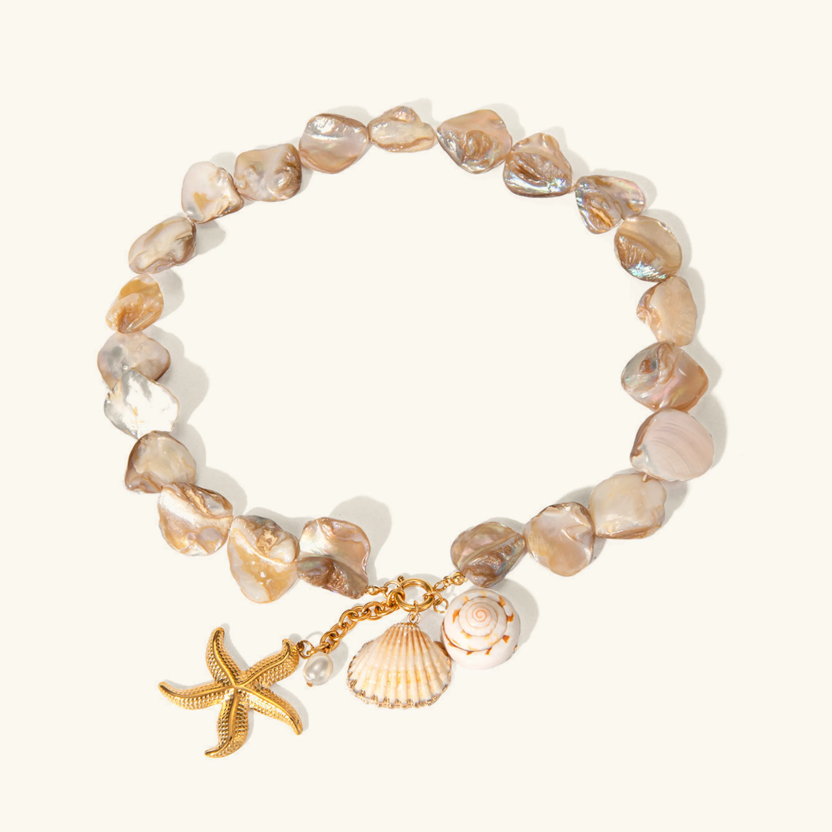 Ocean-Inspired Necklace with Gold Charms – Waterproof and Hypoallergenic Seafarer Design sold by Hensley London