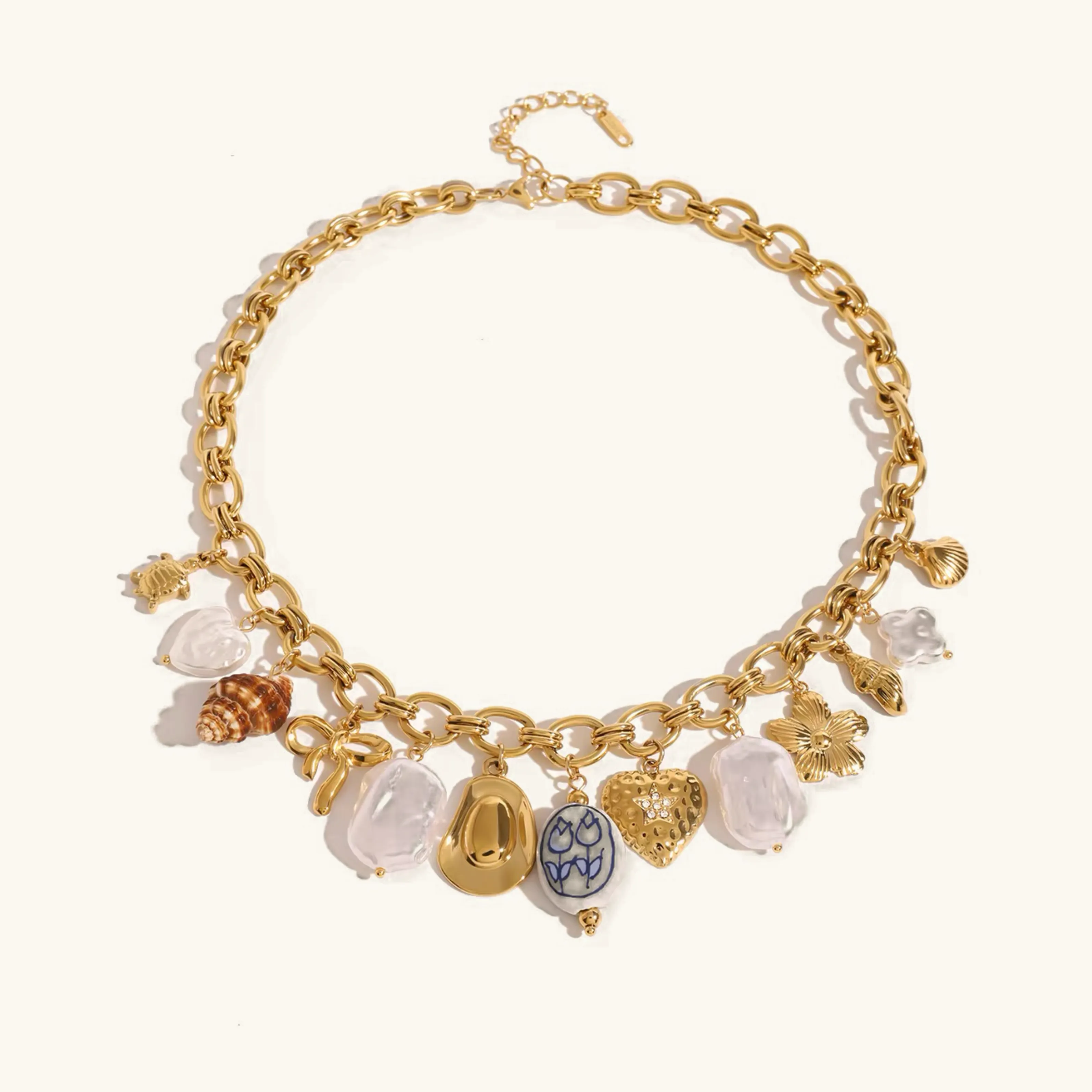 Ocean-Inspired Gold Chain Necklace with Freshwater Pearls and Seashell Charms - Waterproof and Hypoallergenic sold by Hensley London