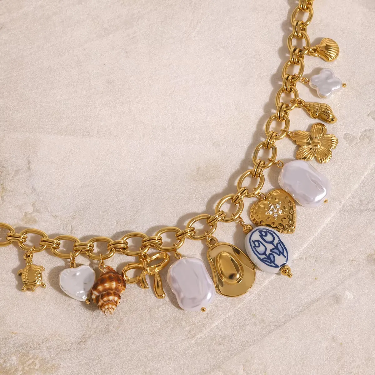 Ocean-Inspired Gold Chain Necklace with Freshwater Pearls and Seashell Charms - Waterproof and Hypoallergenic sold by Hensley London product image thumbnail 2