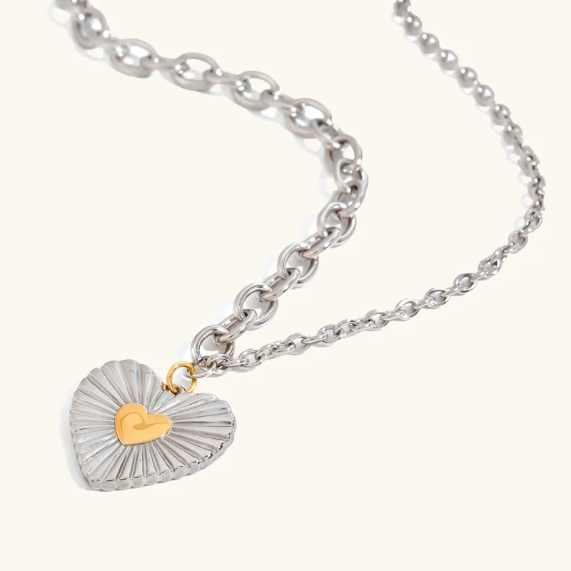 Two-Tone Heart Pendant Necklace – Silver and Gold Stainless Steel, Hypoallergenic, 17-Inch Chain sold by Hensley London