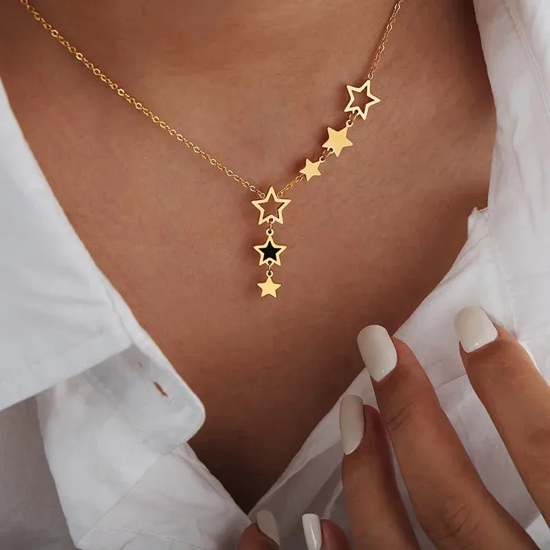 Shooting Star Gold Necklace with Dangling Stars – Elegant Gold Chain Jewelry for Women sold by Hensley London