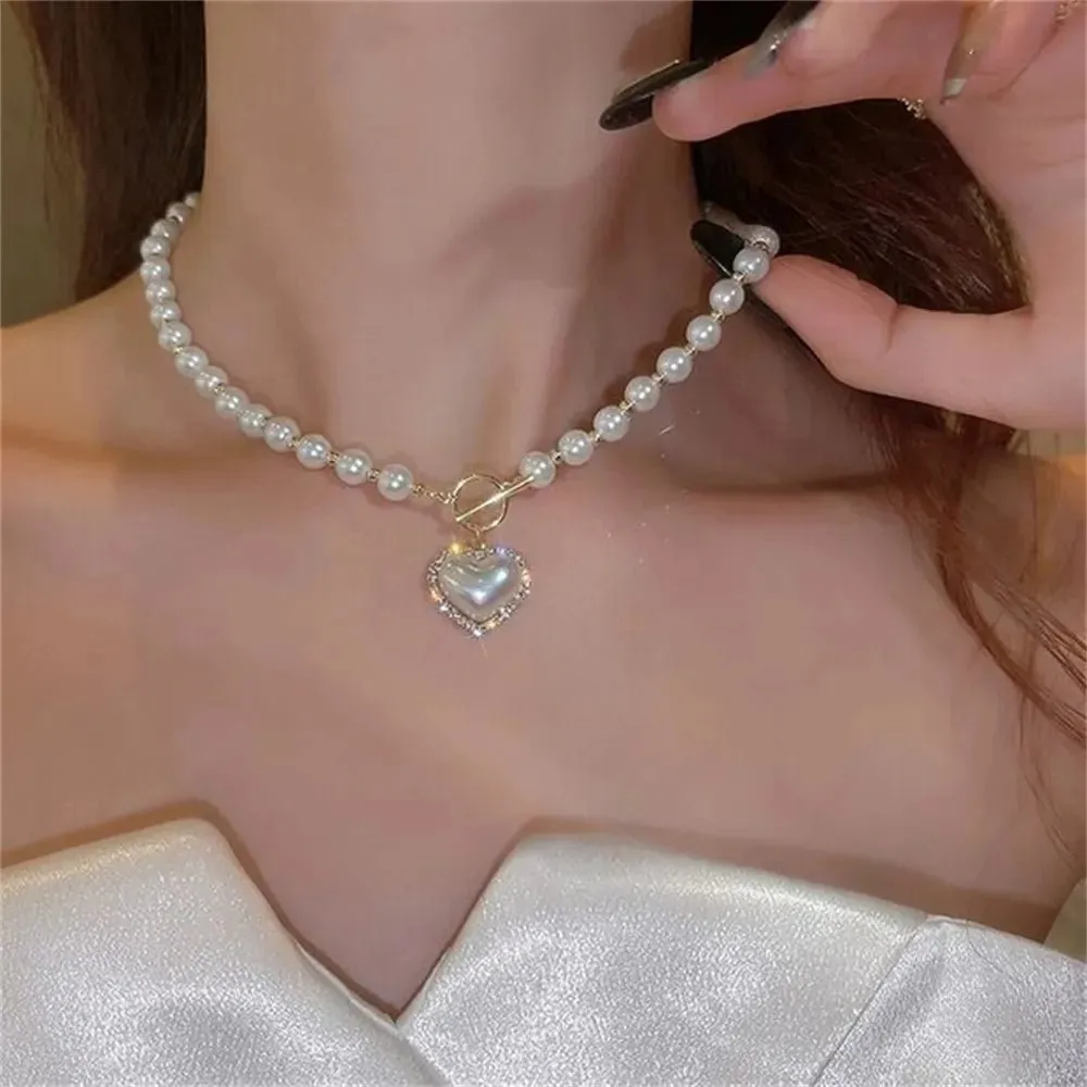 Pearl Heart Clasp Choker Necklace for Women – Elegant Faux Pearl Jewelry with Rhinestone Accents sold by Hensley London product image thumbnail 2