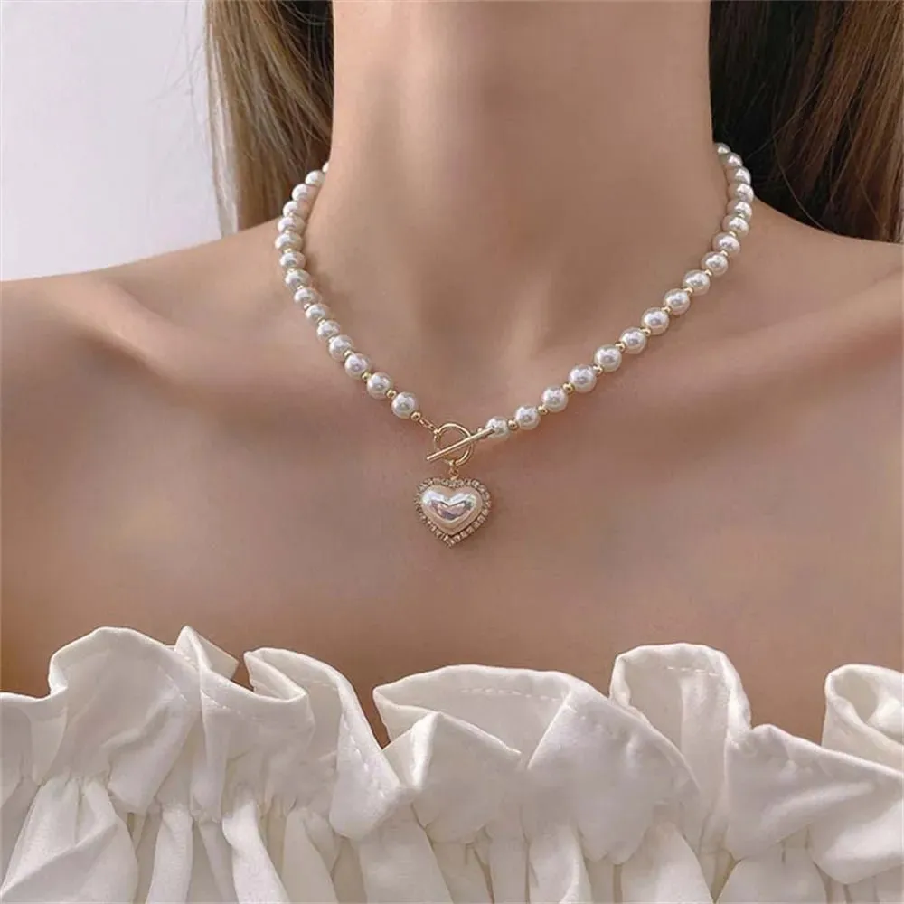 Pearl Heart Clasp Choker Necklace for Women – Elegant Faux Pearl Jewelry with Rhinestone Accents sold by Hensley London