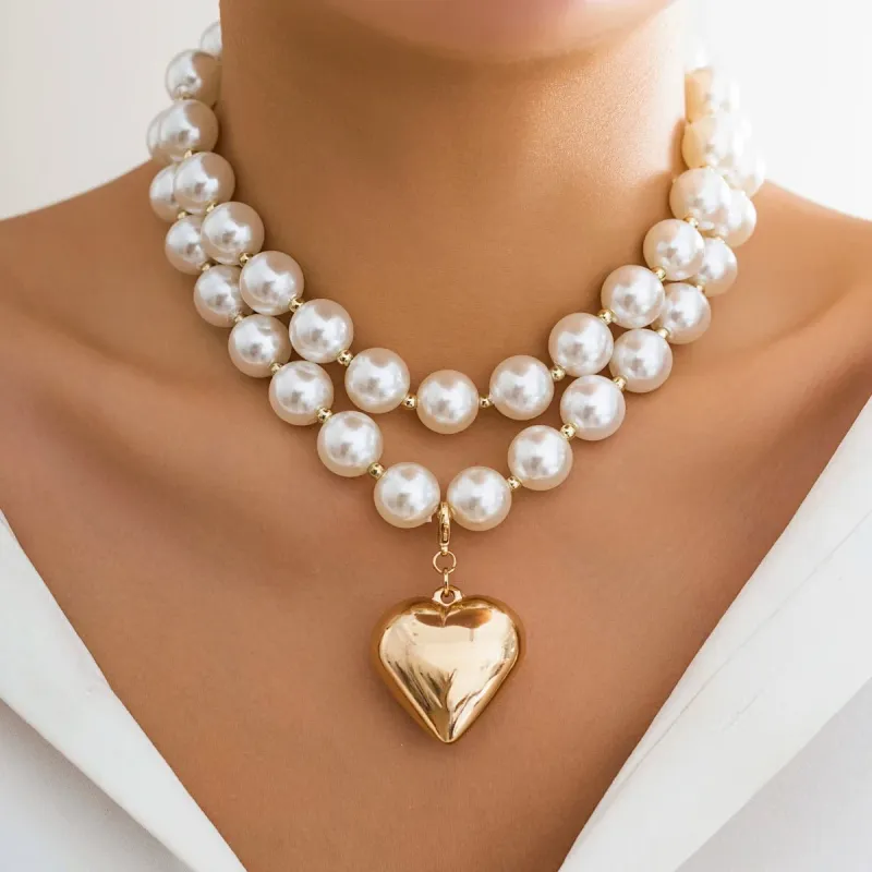 Bold Pearl Necklace with Gold Heart Pendant – Layered Design, Adjustable Length sold by Hensley London