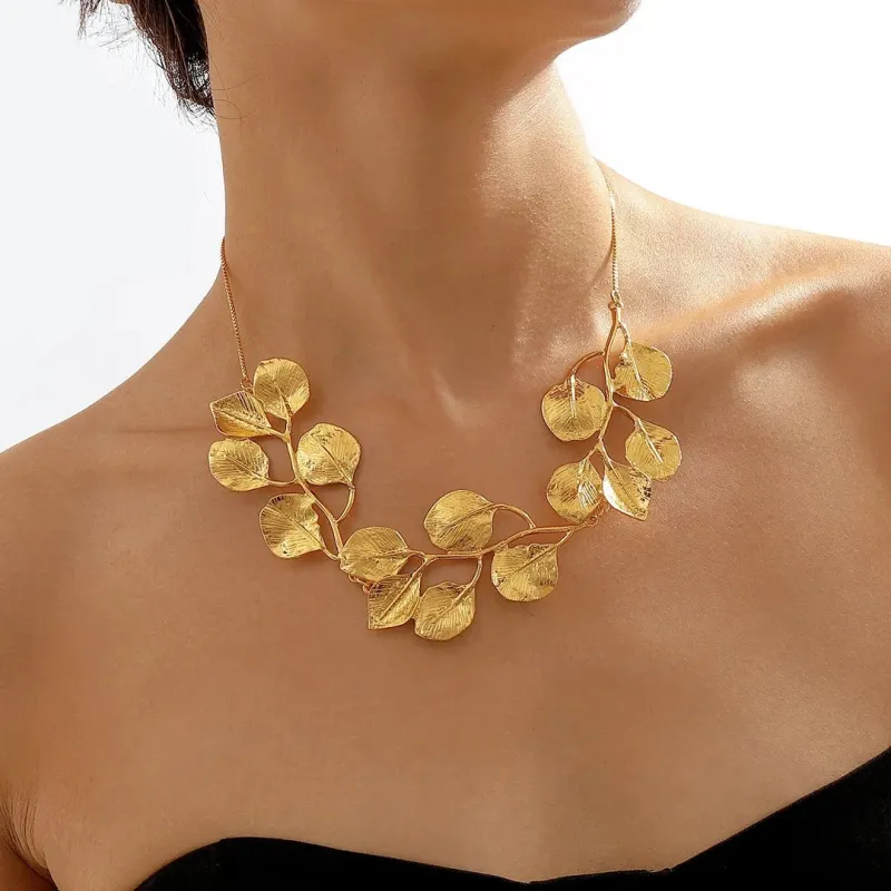 Nature's Leaf Statement Necklace in Gold and Silver – Elegant Organic Design sold by Hensley London