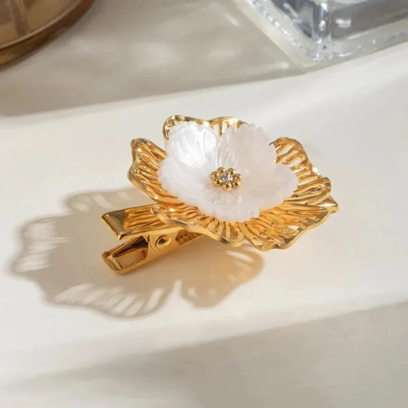 Elegant Petal Pearl Hair Clip with 18k Gold Plating – Hypoallergenic and Waterproof Hair Accessory sold by Hensley London