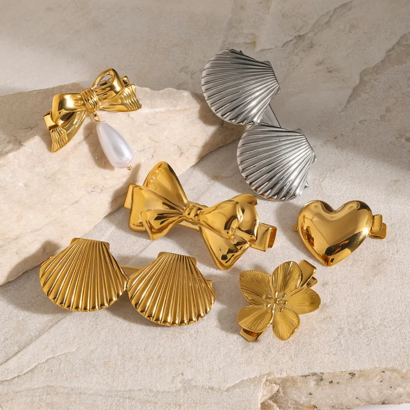 Elegant Gold Hair Clip with Sculpted Petal Design – Waterproof and Hypoallergenic sold by Hensley London