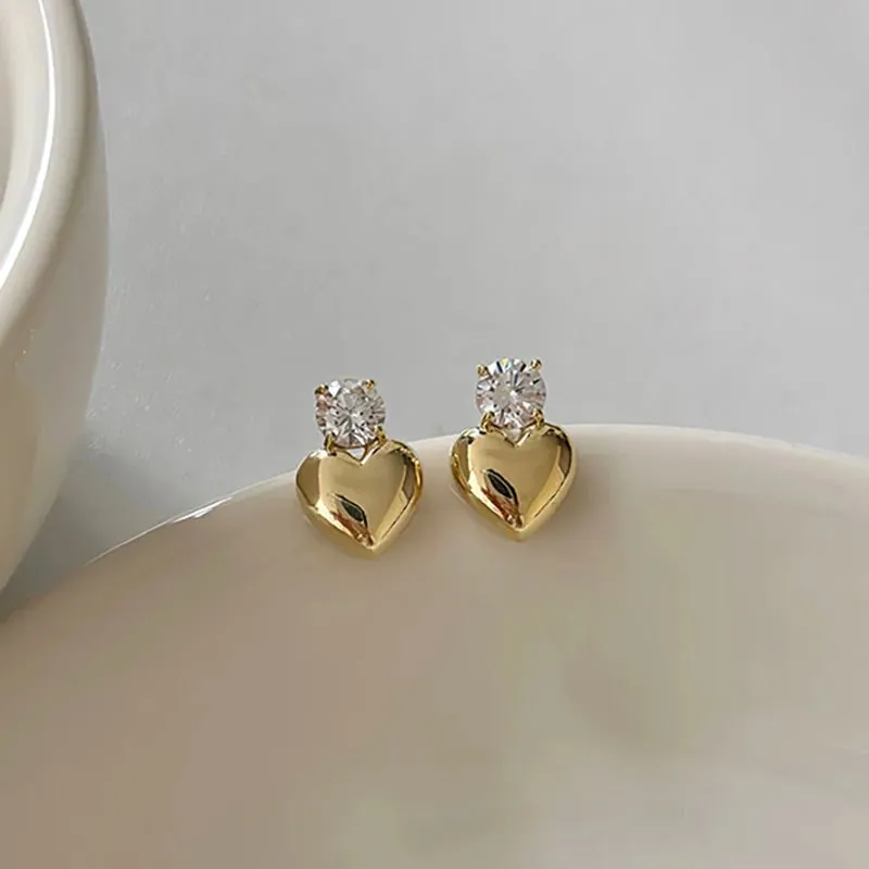 Dainty Heart Stud Earrings for Women with Diamond Accents – Gold and Silver Options, Elegant Design for Casual and Formal Wear sold by Hensley London product image thumbnail 2