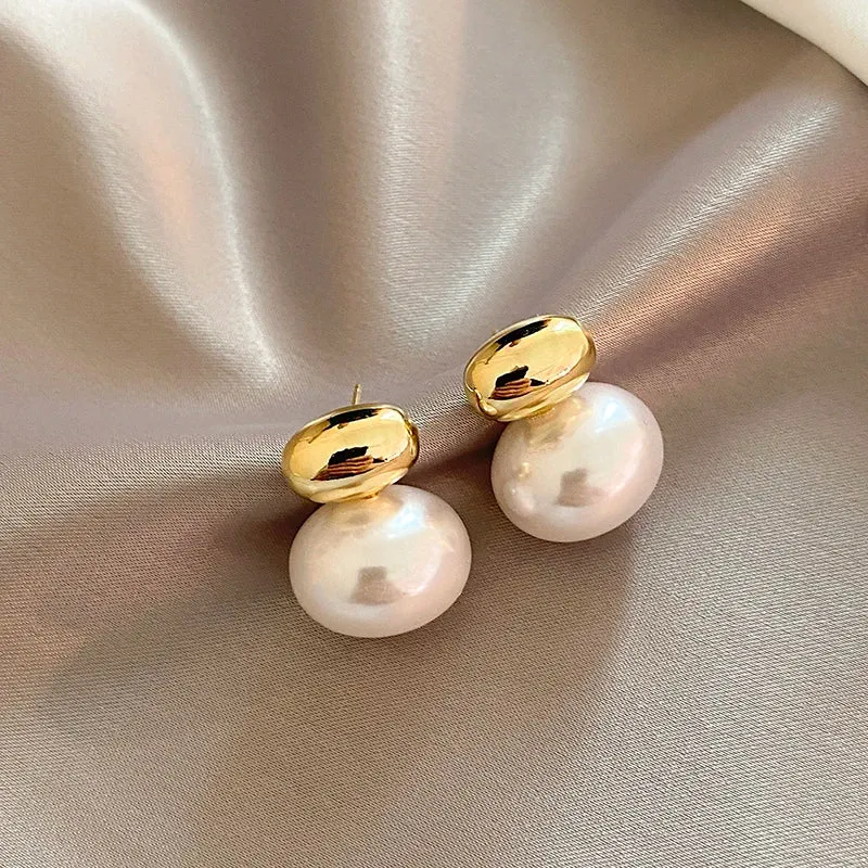 Elegant Gold Accented Pearl Stud Earrings – Timeless Design for Any Occasion sold by Hensley London product image thumbnail 5