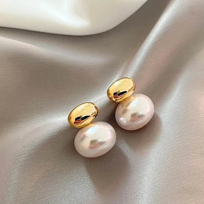 Elegant Gold Accented Pearl Stud Earrings – Timeless Design for Any Occasion sold by Hensley London product image thumbnail 4