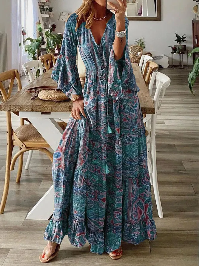 Women’s Deep V-Neck Button Front Bell Sleeves Boho Ruffle Hem Maxi Dress sold by Hensley London