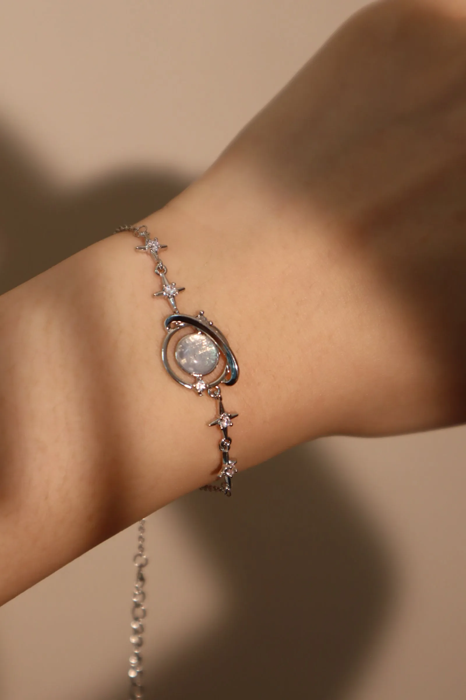 Women's Bracelet Silver Moonstone Saturn Star Design sold by Hensley London