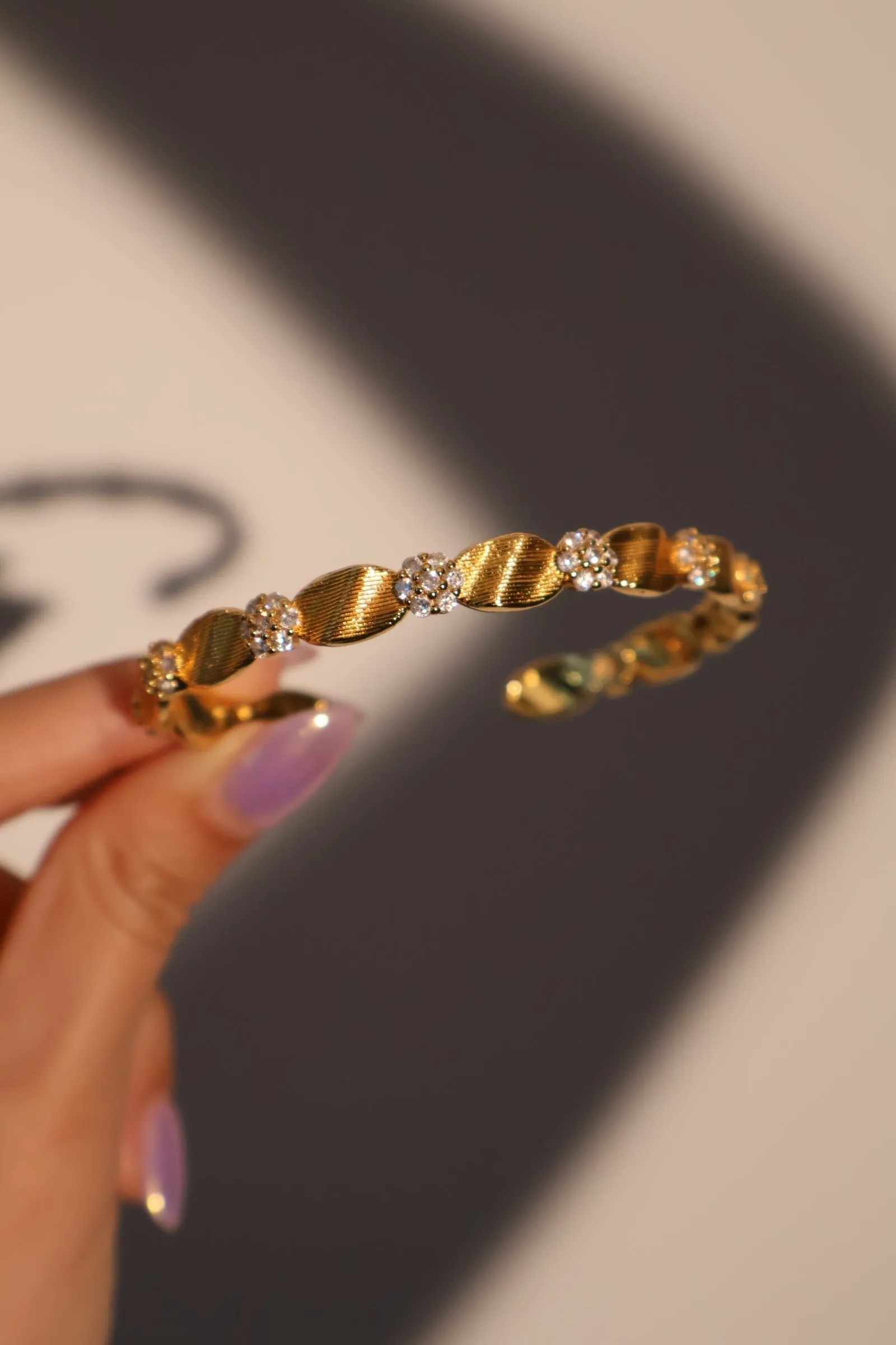 Women's Flower Bracelet Gold Plated Zirconia sold by Hensley London