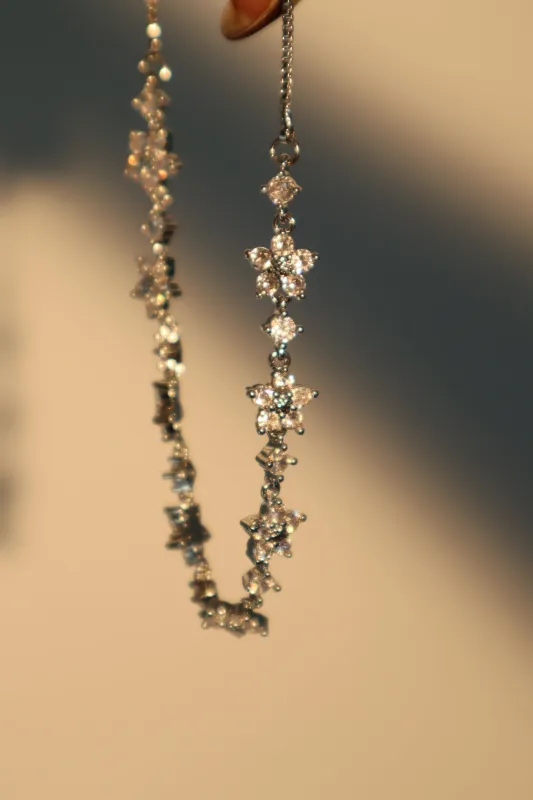 Women's Flower Bracelet Platinum Plated Zirconia Diamonds sold by Hensley London