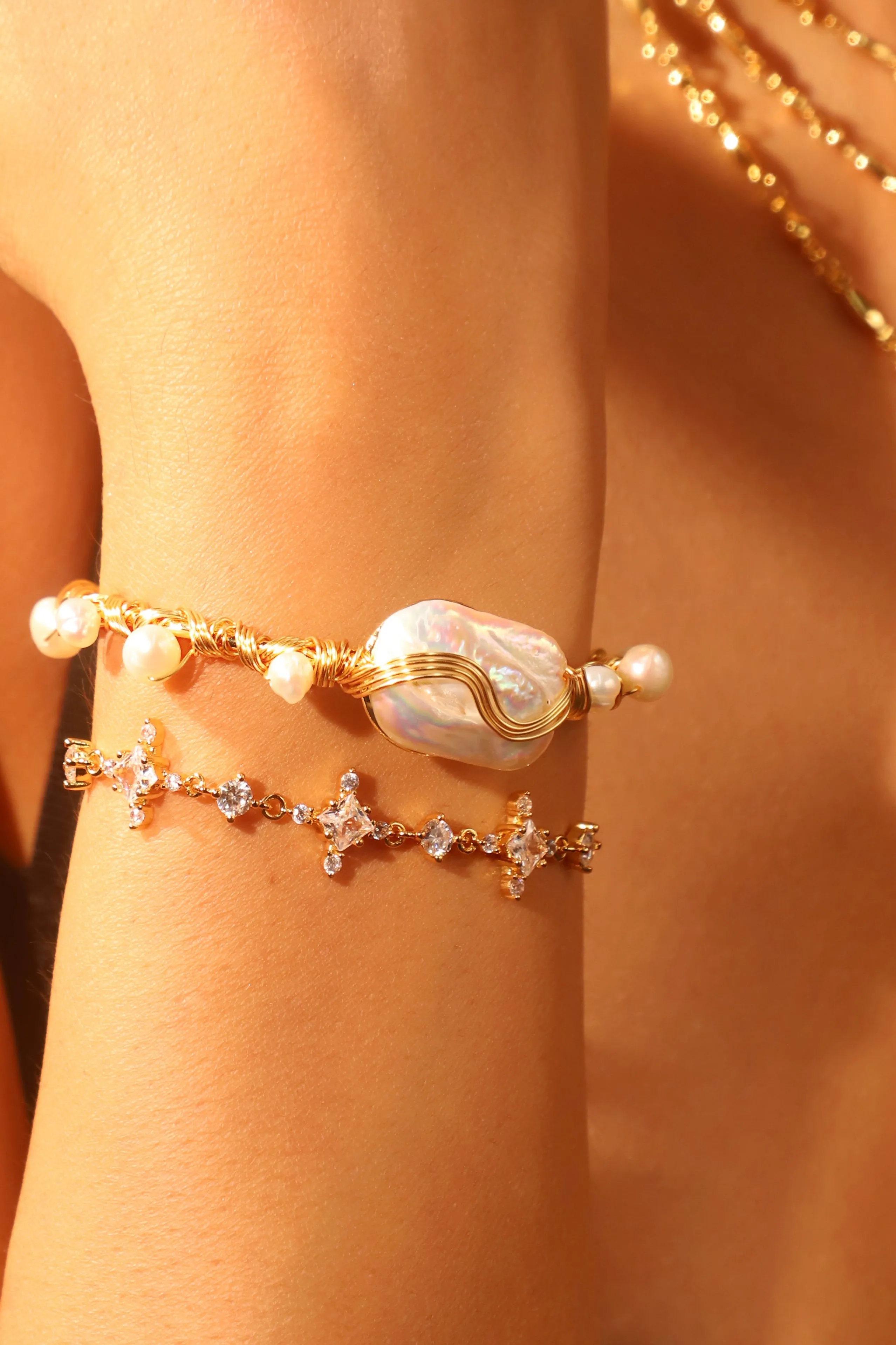 Women's Bracelet Gold Freshwater Pearls Stretchable sold by Hensley London