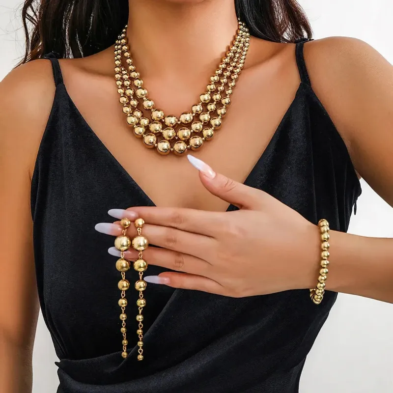 Gold Jewelry Set for Women, Triple Stack Necklace Earrings & Bracelet Set made by Hensley London