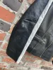 vintage 00s racing stripe leather jacket sold by Good Market Thrift Store
