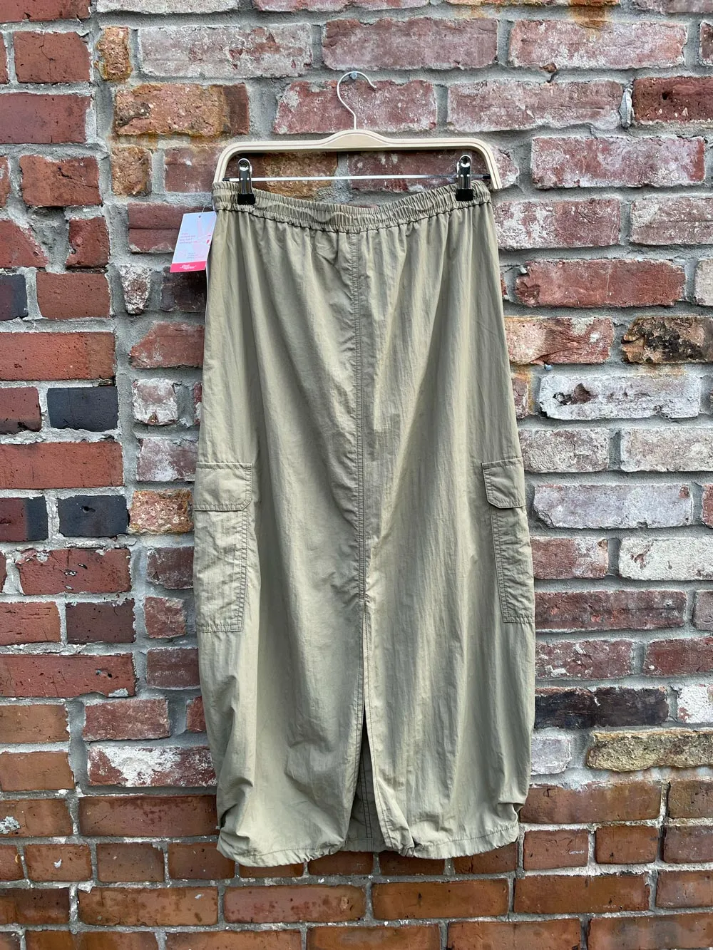 nwt uniqlo nylon drawstring cargo midi skirt sold by Good Market Thrift Store product image thumbnail 2