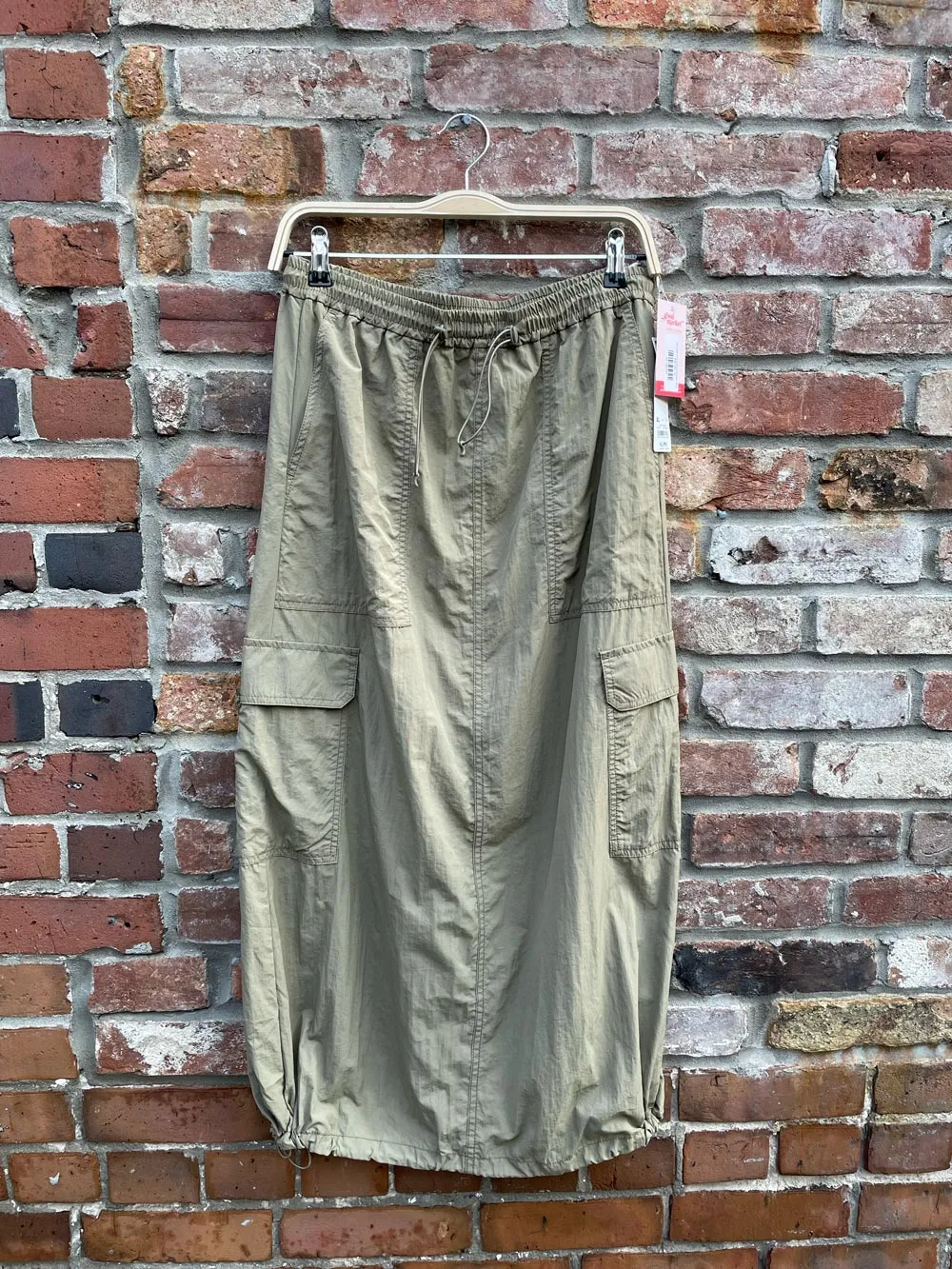 nwt uniqlo nylon drawstring cargo midi skirt sold by Good Market Thrift Store