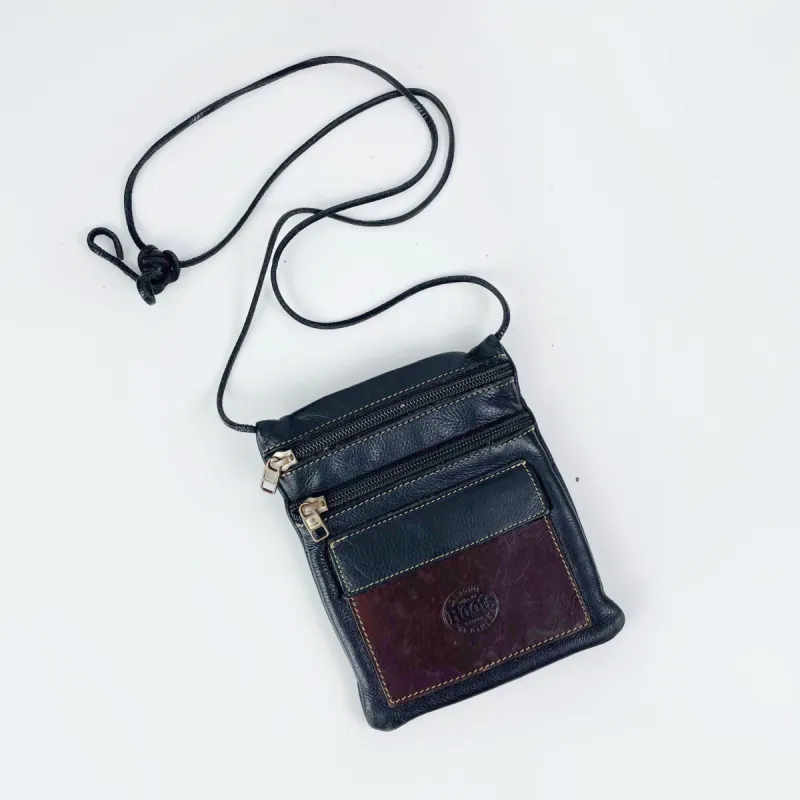 vintage roots two tone leather crossbody sold by Good Market Thrift Store
