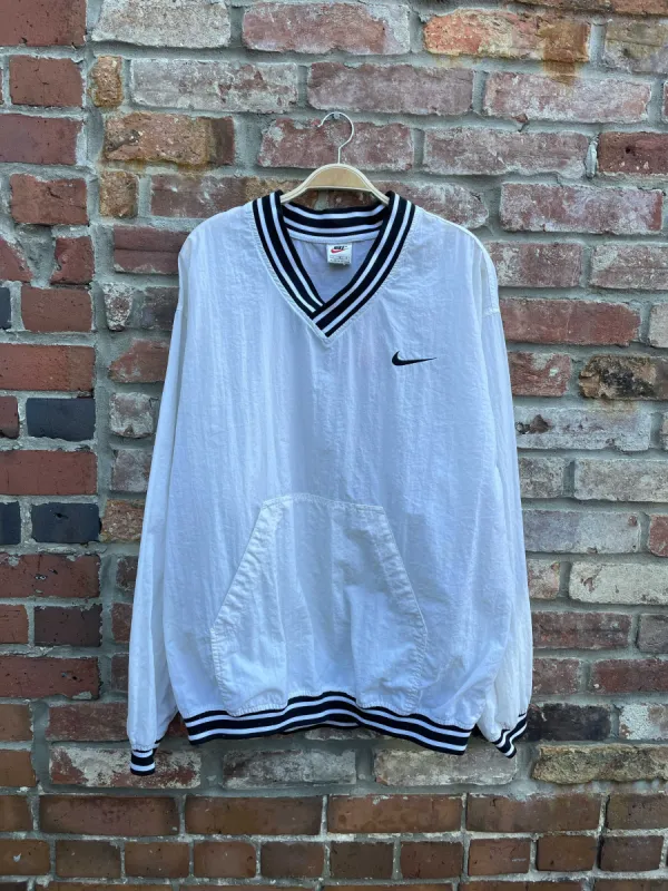 vintage 90s nike windbreaker pullover jacket sold by Good Market Thrift Store