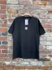 true religion black logo tee sold by Good Market Thrift Store