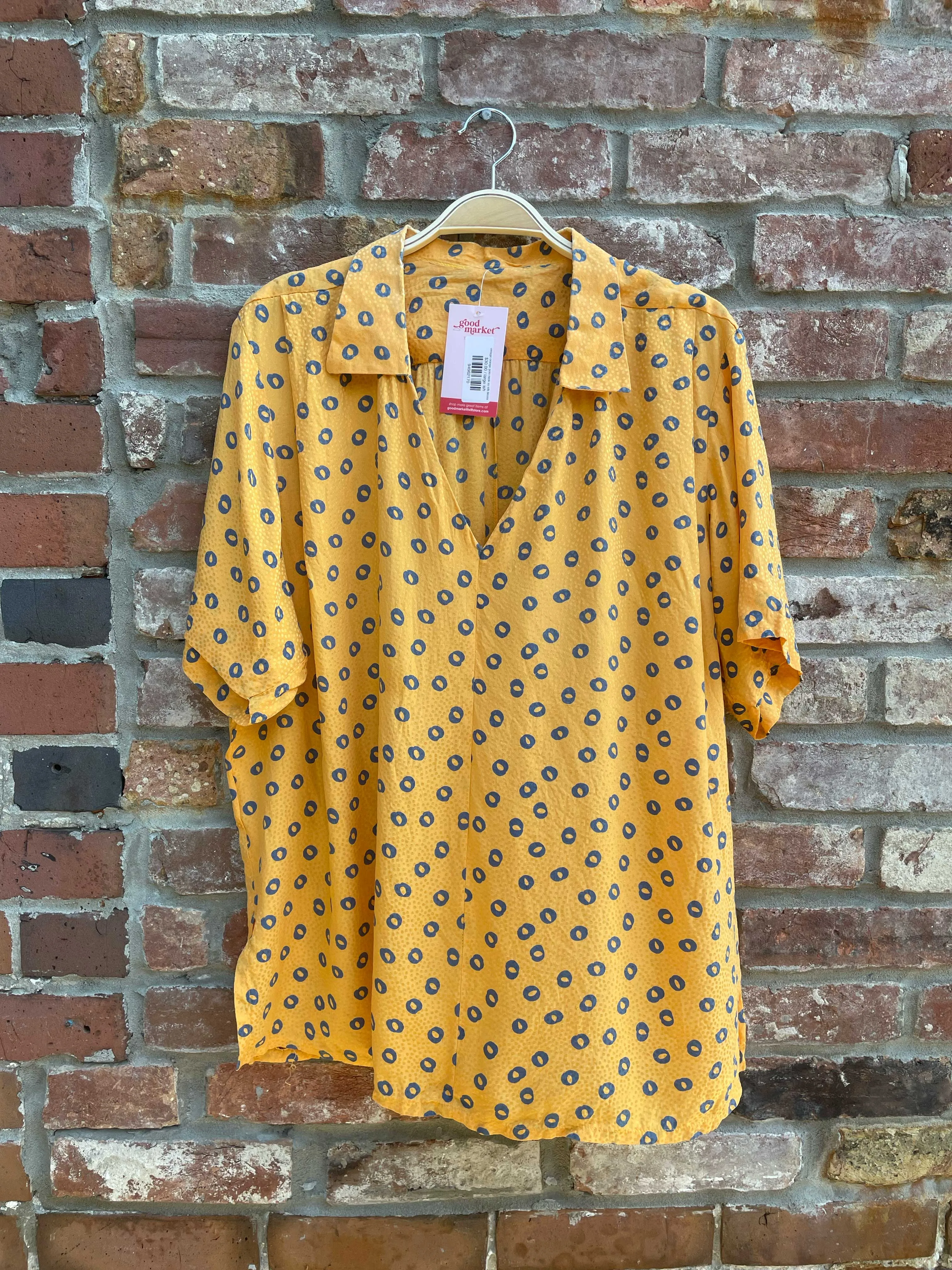 vintage orange polo neck ss silk blouse sold by Good Market Thrift Store