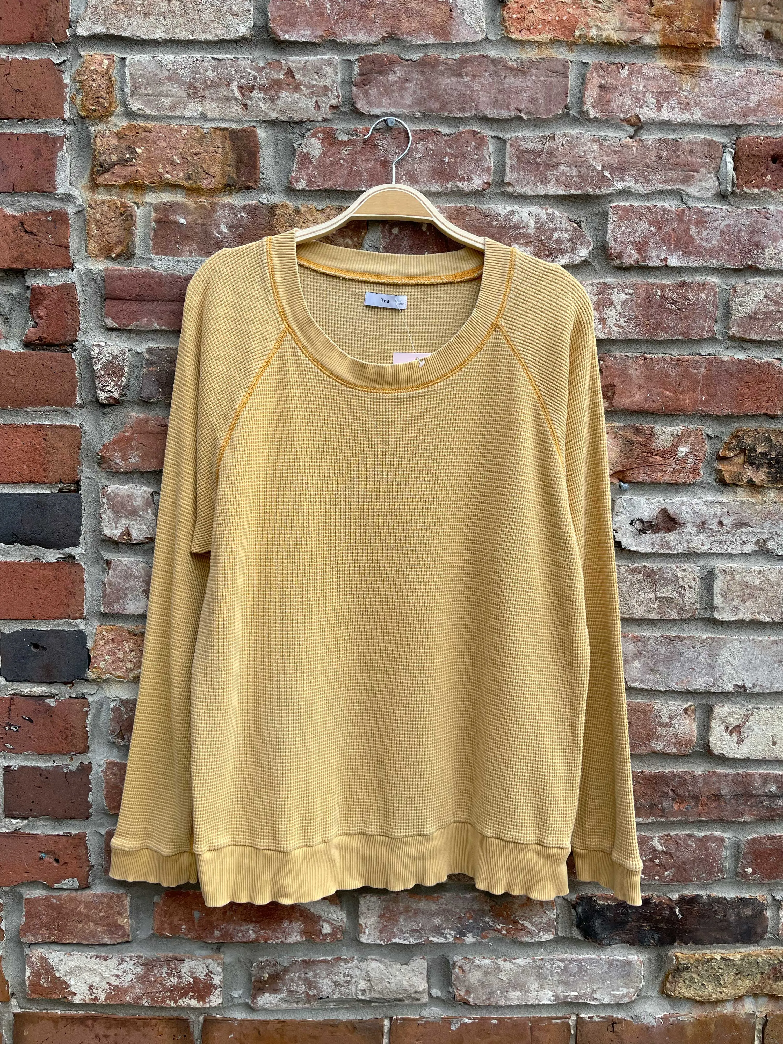 tna waffle long sleeve top sold by Good Market Thrift Store