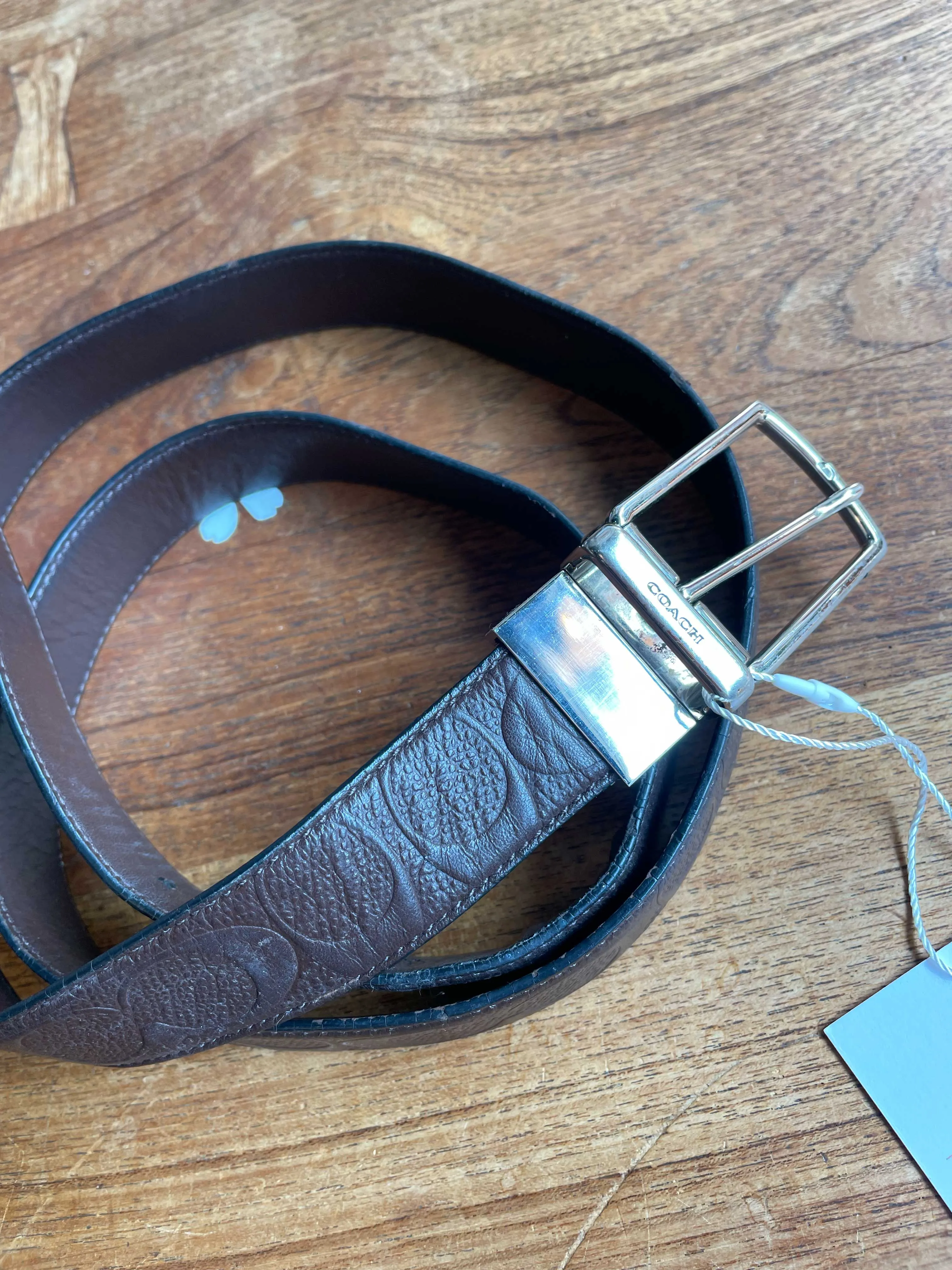 coach monogram embossed leather belt sold by Good Market Thrift Store
