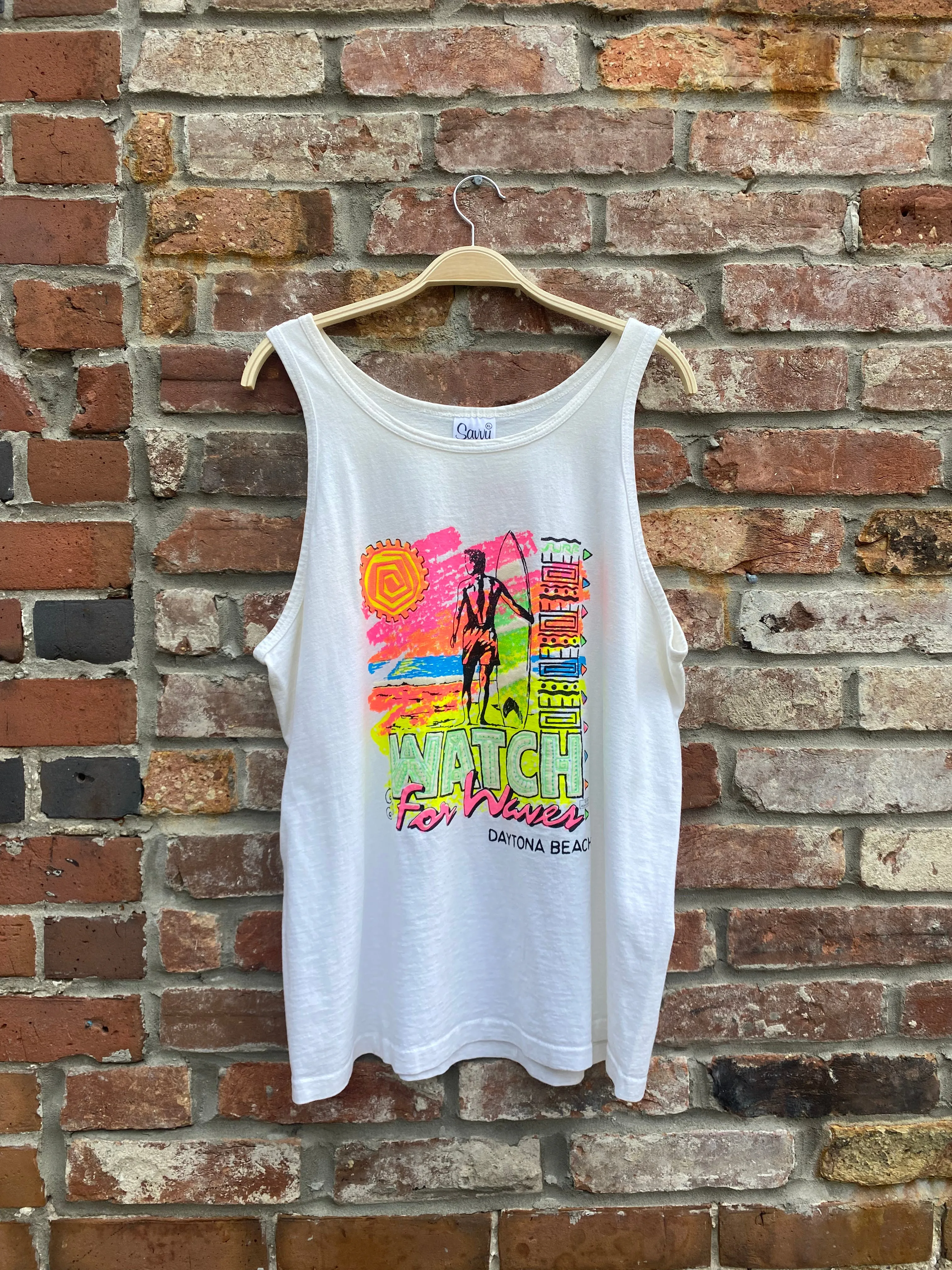 vintage 80s neon daytona beach surf tank sold by Good Market Thrift Store