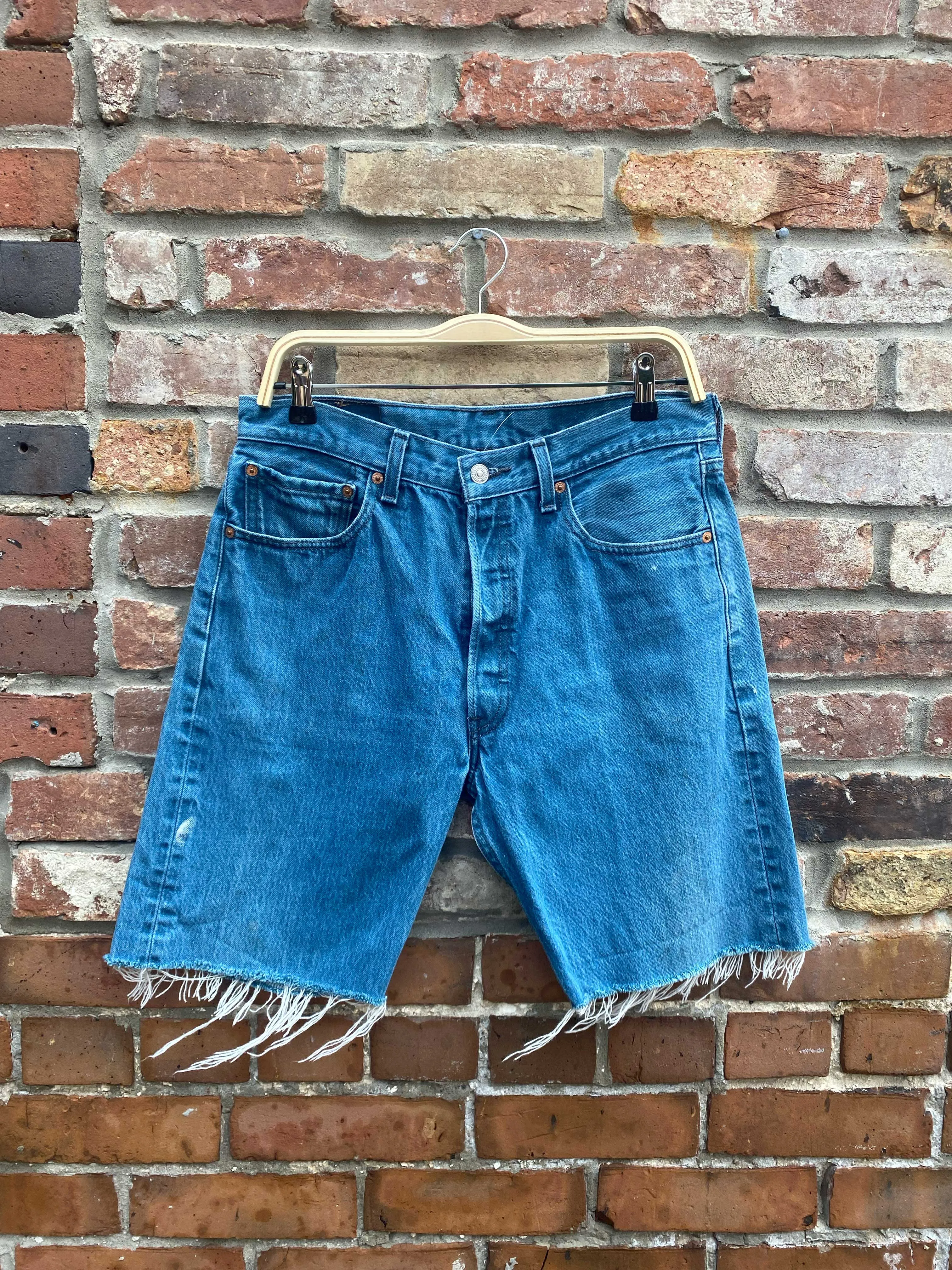 vintage levi's 501 long denim shorts sold by Good Market Thrift Store product image thumbnail 2