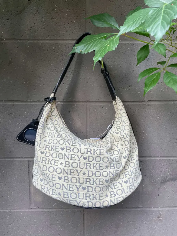vintage 00s dooney & bourke canvas monogram shoulder bag sold by Good Market Thrift Store