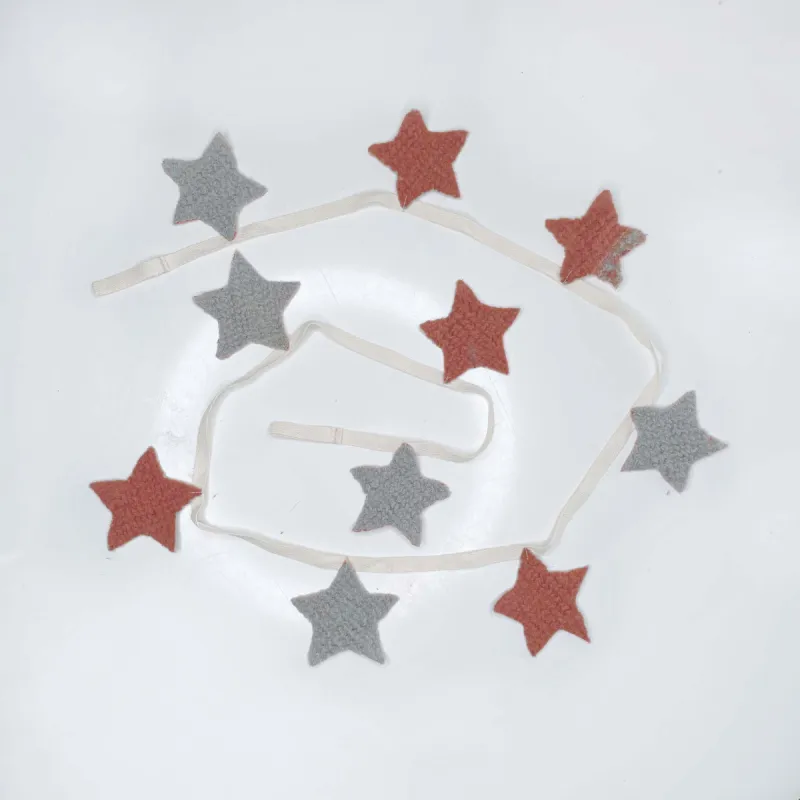 handmade boho wool star garland sold by Good Market Thrift Store