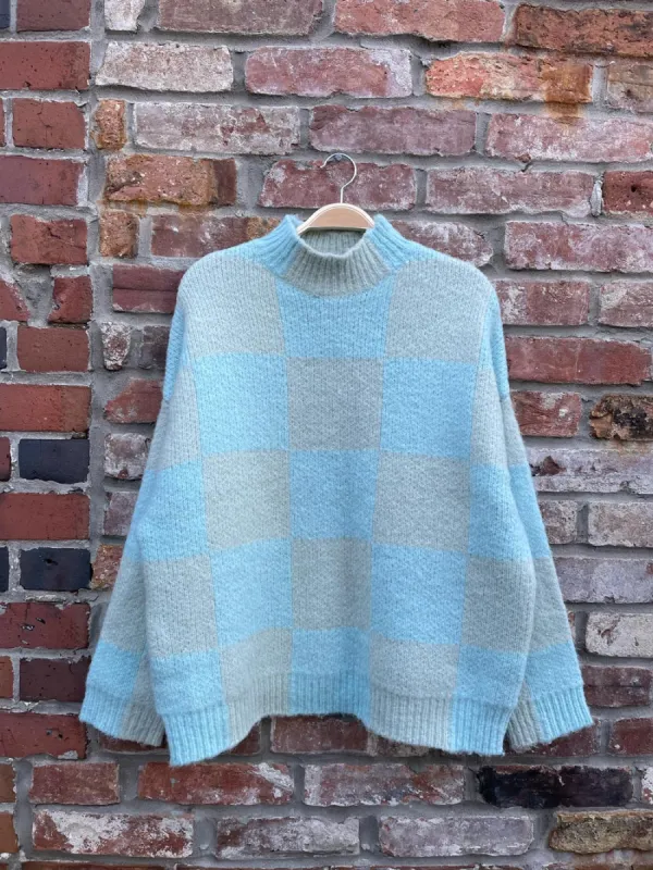 industry wool blend checkerboard knit sweater sold by Good Market Thrift Store