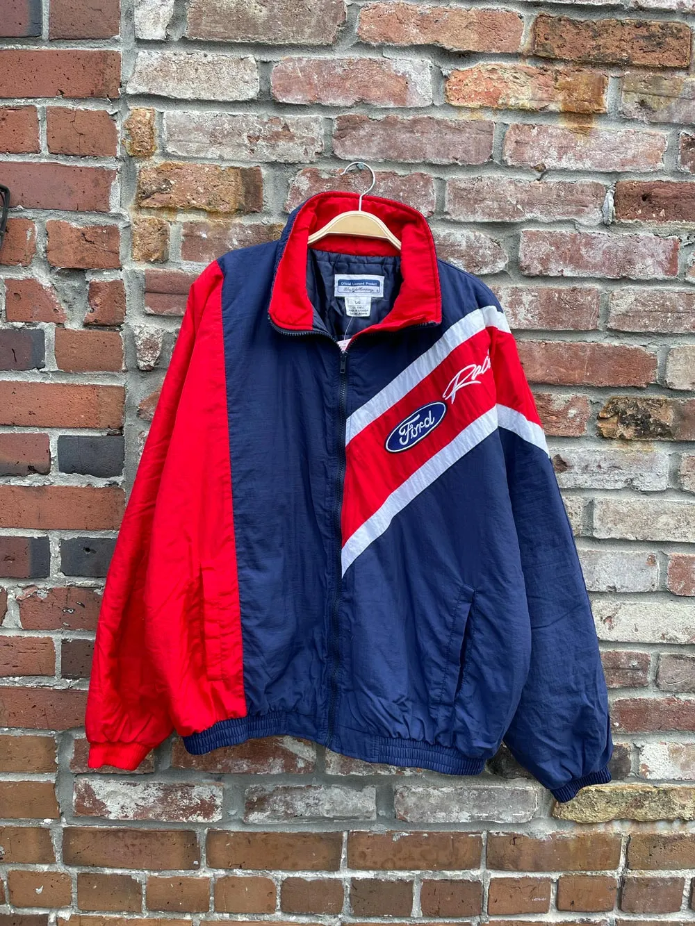vintage 90s ford racing puffer jacket sold by Good Market Thrift Store