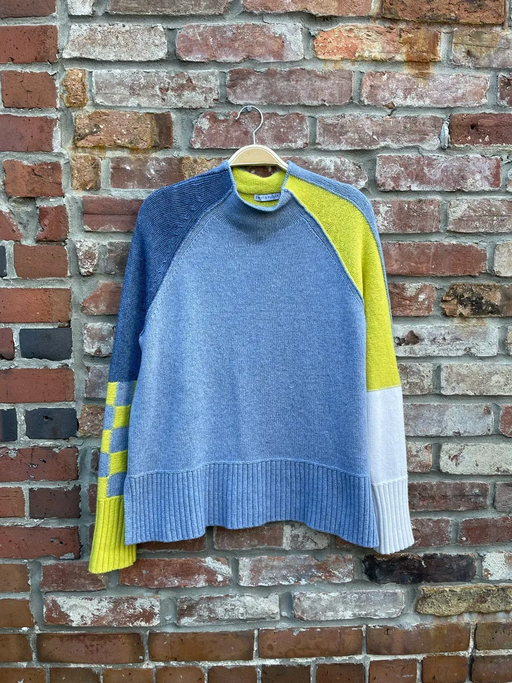 zaket & plover wool blend check detail sweater sold by Good Market Thrift Store