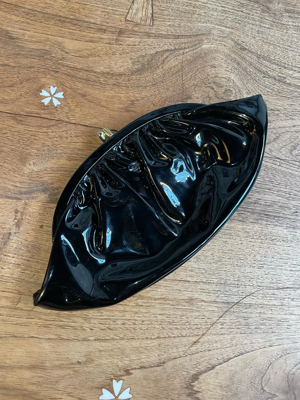 vintage draped patent clutch sold by Good Market Thrift Store