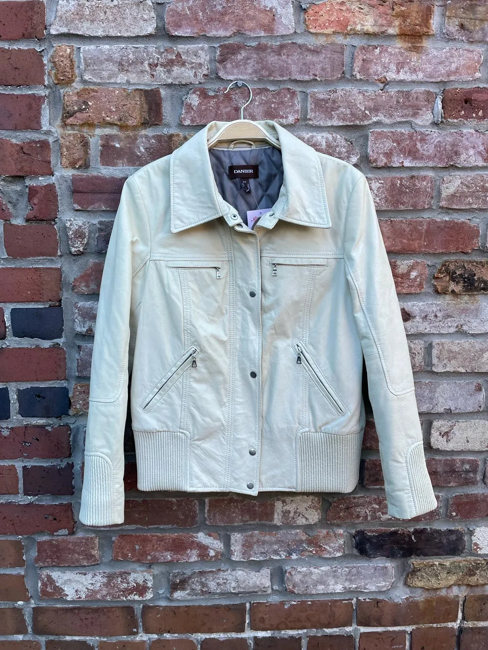 vintage 00s danier cream leather bomber jacket sold by Good Market Thrift Store