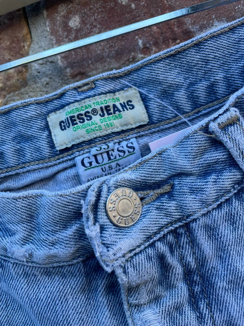 vintage 90s guess light wash jeans sold by Good Market Thrift Store product image thumbnail 2